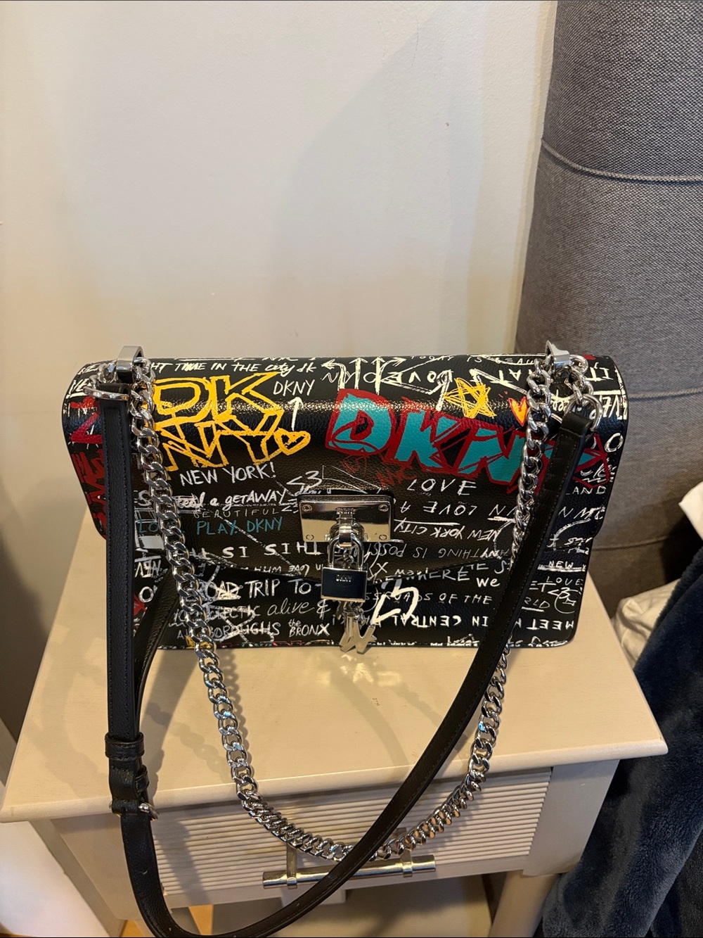 DKNY Black Graffiti-Print Chain Shoulder Bag with Red & Yellow Accents